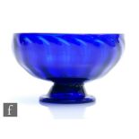 A late Georgian Bristol Blue pedestal bowl, circa 1820, the shallow fluted bowl raised to a swept