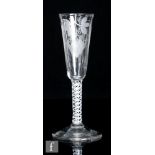 An 18th Century ale glass circa 1765, the tall round funnel bowl engraved with hops and barely above