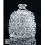 A late Georgian Anglo-Irish clear cut crystal honey pot, circa 1820, of beehive form with heavily