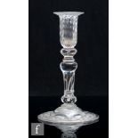A 1930s clear crystal Gray-Stan candlestick inspired by 18th Century designs, with fluted sconce and