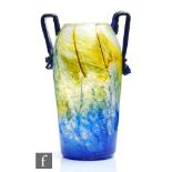 A 1930s Gray-Stan glass vase of shouldered ovoid form, with an internal blue and yellow feathered