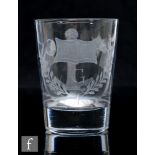 An early 19th Century Masonic glass tumbler, circa 1810, engraved with Masonic emblems above the