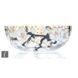 A 1930s French glass bowl by Albert Mazoyer, of circular section enamel decorated with white