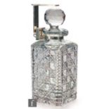 An early 20th Century clear crystal decanter of square section, the body decorated all over in the