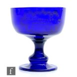 A 19th Century Bristol Blue pedestal bowl, circa 1869, the ovoid bowl raised to a baluster stem