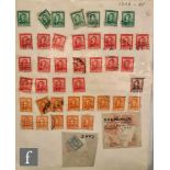 An album of British pre-decimal stamps mounted mint on sheets, a stock album of British stamps, a