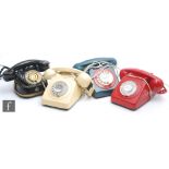A post 1950s cradle telephone in dark green, red and white, model 746F, another the same model in