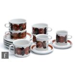 A small collection of assorted Arabia coffee wares decorated with tonal brown flowers, designed by