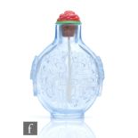 A Chinese 18th/19th Century transparent blue glass archaic snuff bottle of flattened circular