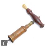 A 19th Century Kings style patent corkscrew, turned rosewood handle with brush, brass cylinder,