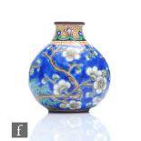 A Chinese Beijing enamel snuff bottle of rounded pear form, the copper body painted with cobalt blue