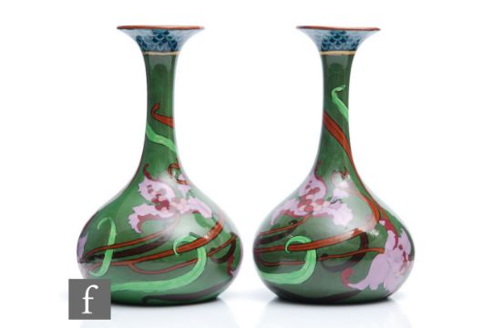 A pair of early 20th Century Foley (Wileman & Co) Art Nouveau Intarsio bottle vases each decorated