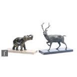 A 20th Century bronzed spelter study of a trotting stag, on a black veined marble base, length 30cm,
