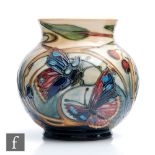 A Moorcroft Pottery vase of ovoid form decorated in the Hartgring pattern designed by Emma
