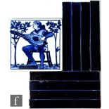 A 6 inch blue and white tile from the Musicians series, together with eight oblong 8 inch x 1 inch