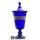 An early 20th Century Moser Karlsbad cobalt blue glass goblet and cover, of footed tapered