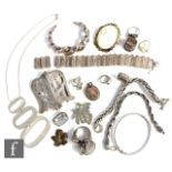 A small parcel lot of assorted silver and white metal jewellery to include a three bracelets,