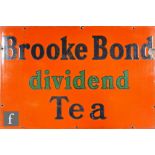 A wall mounted enamel advertising sign for Brooke Bond Dividend Tea, blue and green lettering