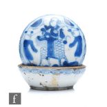 A Chinese 19th Century wax seal box, the circular lidded box painted in underglazed blue with