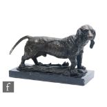 A 20th Century bronze study of a dachshund, after Mastel, on black veined marble plinth, width 36cm.