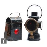 A Lucas King of the Road black painted vintage car lamp with brass bezel and red lens, height