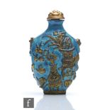 A Chinese Late Qing Dynasty 'Robin's Egg' glazed porcelain snuff bottle of rounded form, moulded