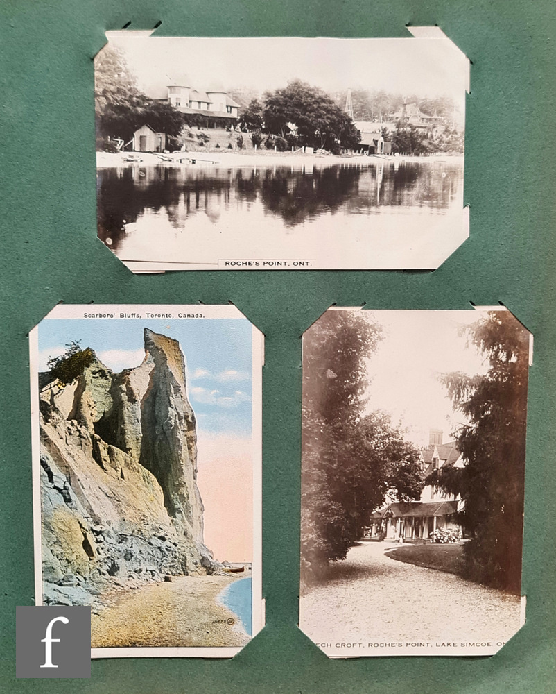 A large Edwardian postcard album containing English views, glamour and greetings and another album