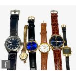 Six assorted modern lady's and gentleman's quartz and manual wrist watches. (6)