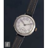 An early 20th Century silver Rolex wrist watch, Arabic numerals to a white enamelled dial, case