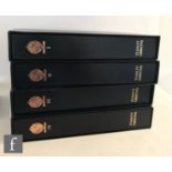 A set of four Stanley Gibbons Great Britain postage stamp albums with slip covers, unused Queen