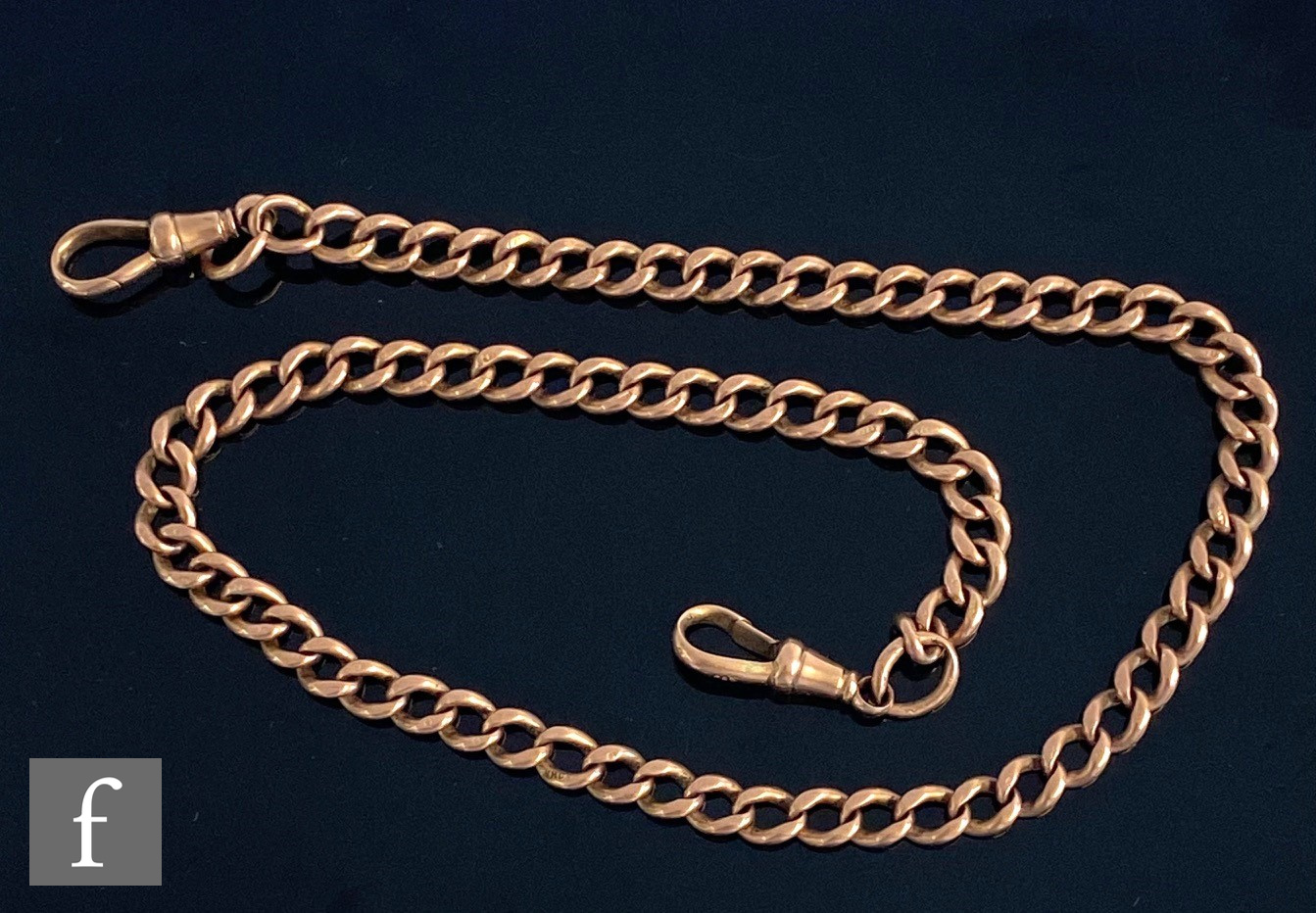A 9ct rose gold uniform link Albert chain terminating in end swivels, weight 30g, length 41cm, S/D.