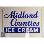 A wall mounted advertising enamel sign for Midland Counties Ice Cream, royal blue lettering