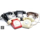 A post 1950s red and cream cradle telephone, No 706F, another similar in dark brown, BLD16, a