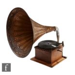 An early 20th Century oak cased horn gramophone, brown tin painted horn with de luxe sound box and