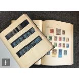 Two Stanley Gibbons green Simplex albums containing a collection of British and Commonwealth postage