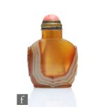 A Chinese mid 19th Century banded agate snuff bottle, of flattened square form on a wide recessed