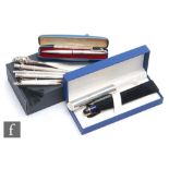 A Yard.O.Led silver cased fountain pen, a ball point pen, both cased, a Waterman?s blue marbled