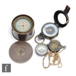 An early 20th Century compass in gimbal mount and drum case, a pocket compass by JMG & Sons, MKIX,