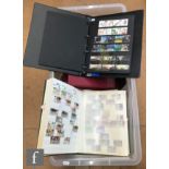 A large crate containing a collection of Great Britain, Commonwealth and world postage stamps,