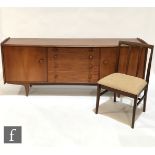 A post war Volnay range teak dining suite, circa 1970, designed by John Herbert for A. Younger