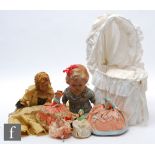 A collection of assorted dolls, to include a 1930s boudoir doll with painted stockinette face and