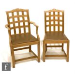 A set of eight early 20th Century light oak Chartwell chairs by Heal and Son Ltd, each with a shaped