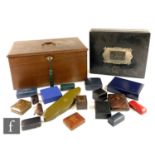 A mahogany fall front jewellery box, tray and two short over a long drawers, with brass carrying