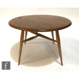 An Ercol Furniture model 308 elm and beech folding occasional table, designed by Lucian Ercolani,