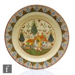 An early 20th Century Royal Doulton Seriesware charger in the Sampler pattern D3749, printed marks