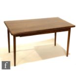 A post war Danish fold-over 'butterfly' dining table, designed by Kurt Ostervig for KP Mobler,