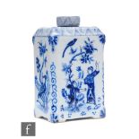 An 18th Century Delft square tea caddy, painted in tones of blue in the Chinoiserie taste with