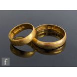 Two 22ct hallmarked wedding ring of plain form, total weight 6.8g, ring sizes J and W. (2)