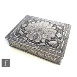 A Persian silver rectangular box decorated with animals in a foliate setting, weight 6.5oz, length