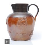 A large 19th Century Port Dundas Glasgow pottery salt glazed tavern jug decorated with relief